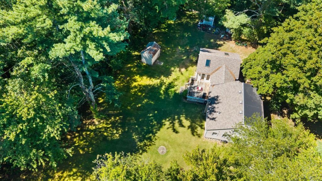 627 First Parish Road Scituate, MA 02066 - Photo 30 of 33 a backyard of a house with lots of green space