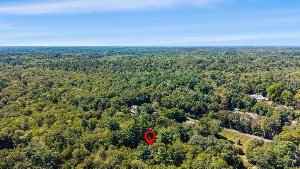 627 First Parish Road Scituate, MA 02066 - Photo 31 of 33 an aerial view of residential building with green space and fog