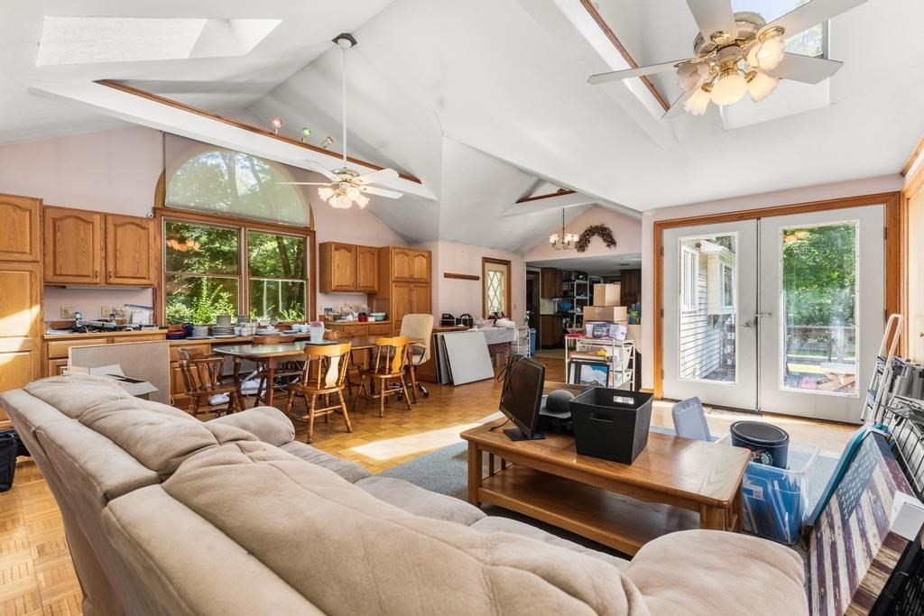 627 First Parish Road Scituate, MA 02066 - Photo 4 of 33 a living room with furniture kitchen view and a large window