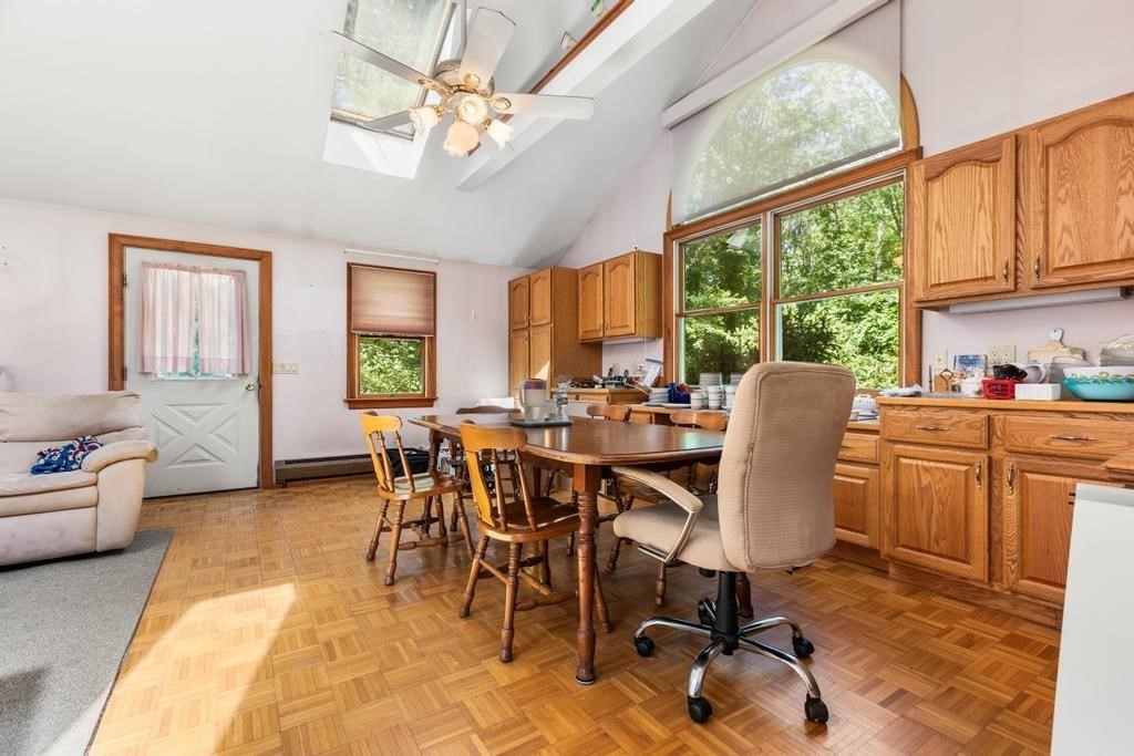 627 First Parish Road Scituate, MA 02066 - Photo 6 of 33 a view of a dining room with furniture window and outside view