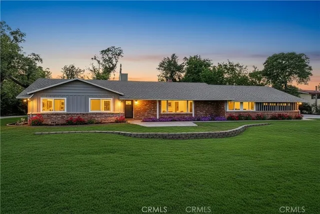 a view of a house with a big yard