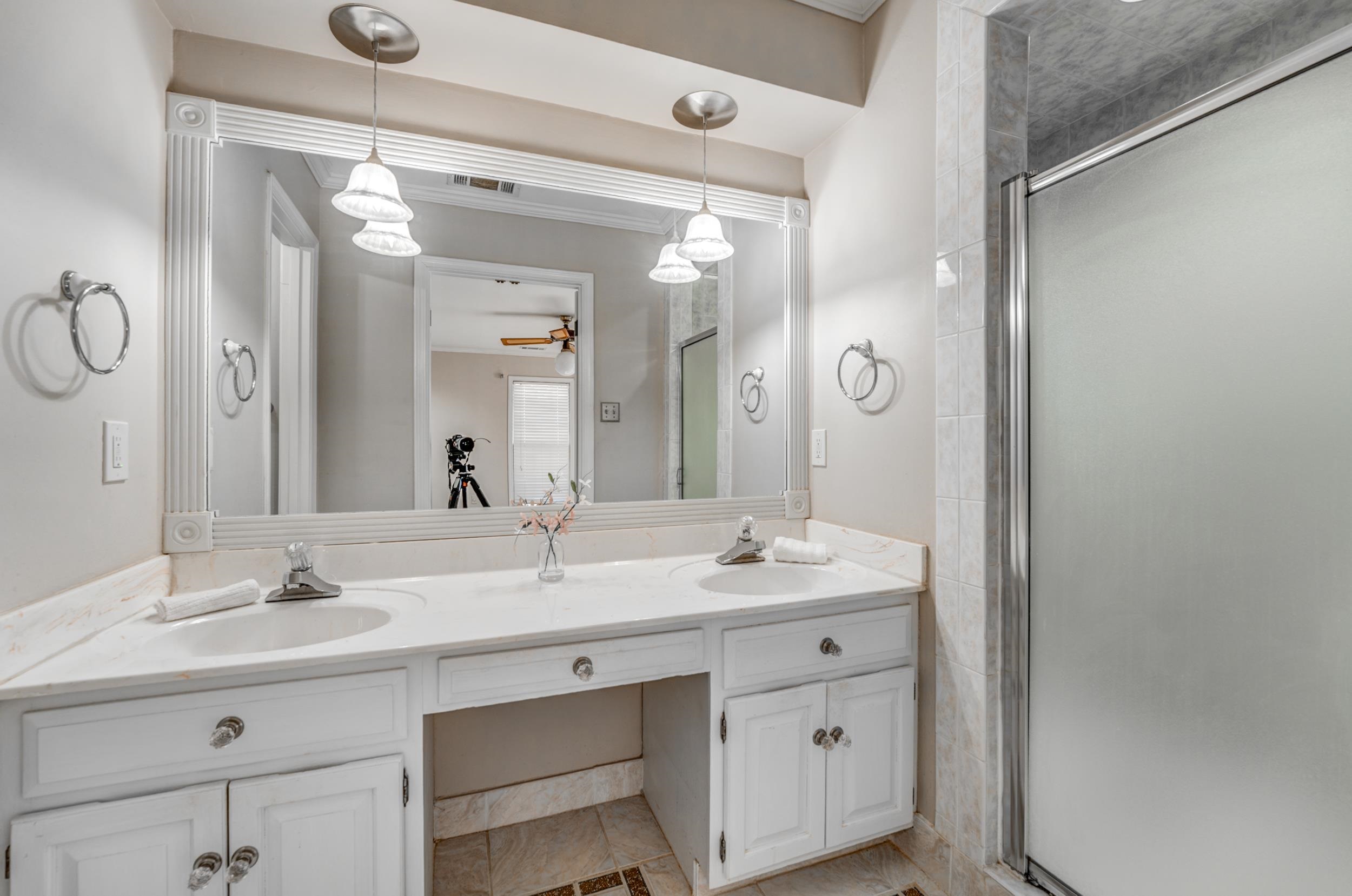 2997 Riverdale Road Memphis, TN 38119 - Photo 35 of 35 Full bathroom with double vanity, a stall shower, a ceiling fan, and ornamental molding