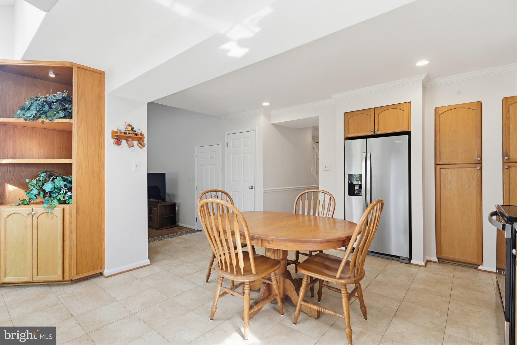 3067 Schubert Drive Silver Spring, MD 20904 - Photo 12 of 41 a dining room with furniture and a window