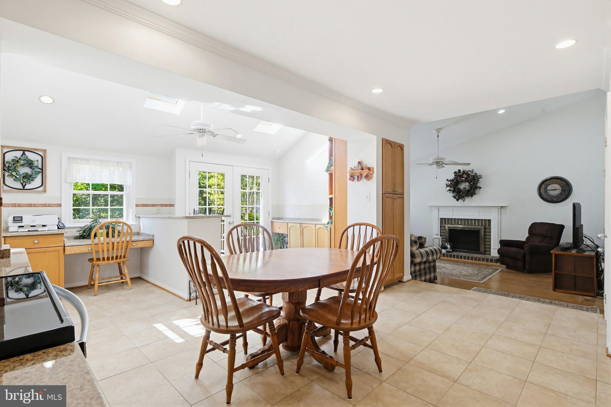 3067 Schubert Drive Silver Spring, MD 20904 - Photo 13 of 41 a dining room with furniture and fireplace