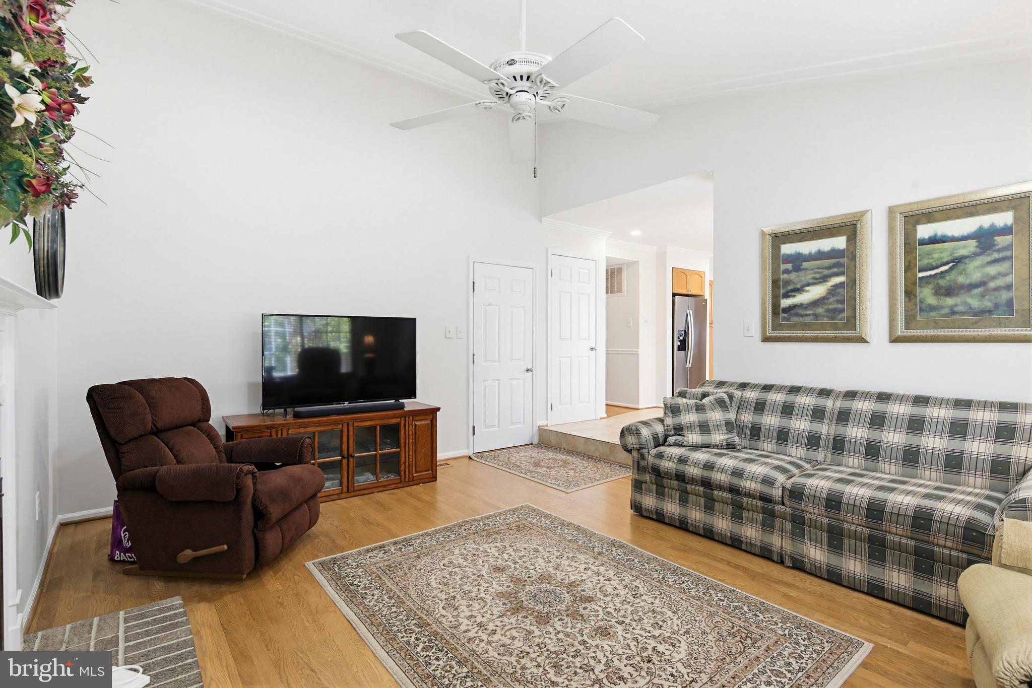 3067 Schubert Drive Silver Spring, MD 20904 - Photo 15 of 41 a living room with furniture and a flat screen tv