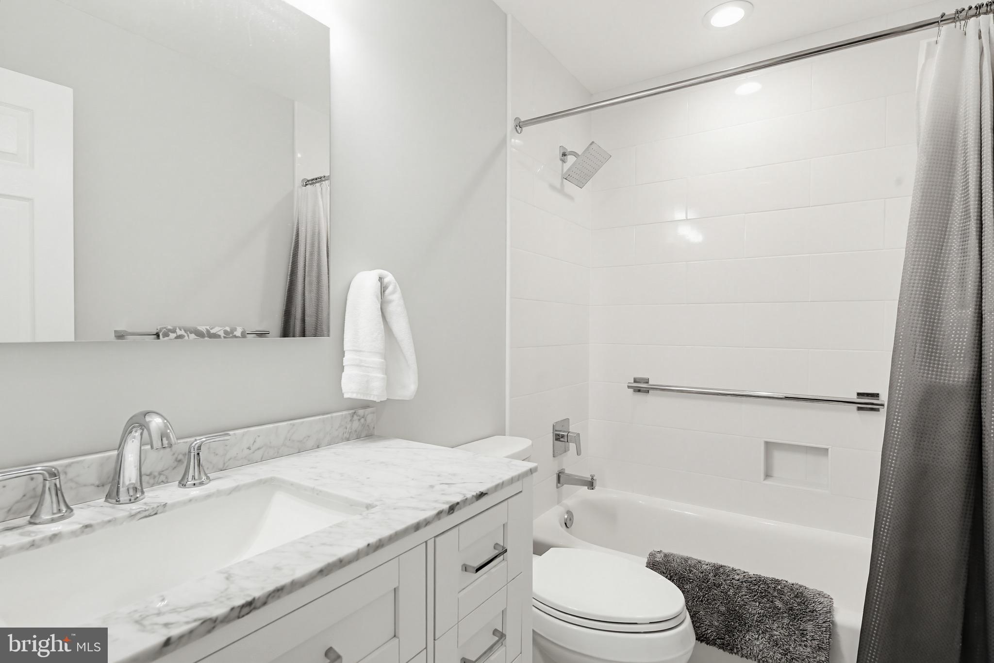 3067 Schubert Drive Silver Spring, MD 20904 - Photo 22 of 41 a bathroom with a granite countertop sink toilet and shower