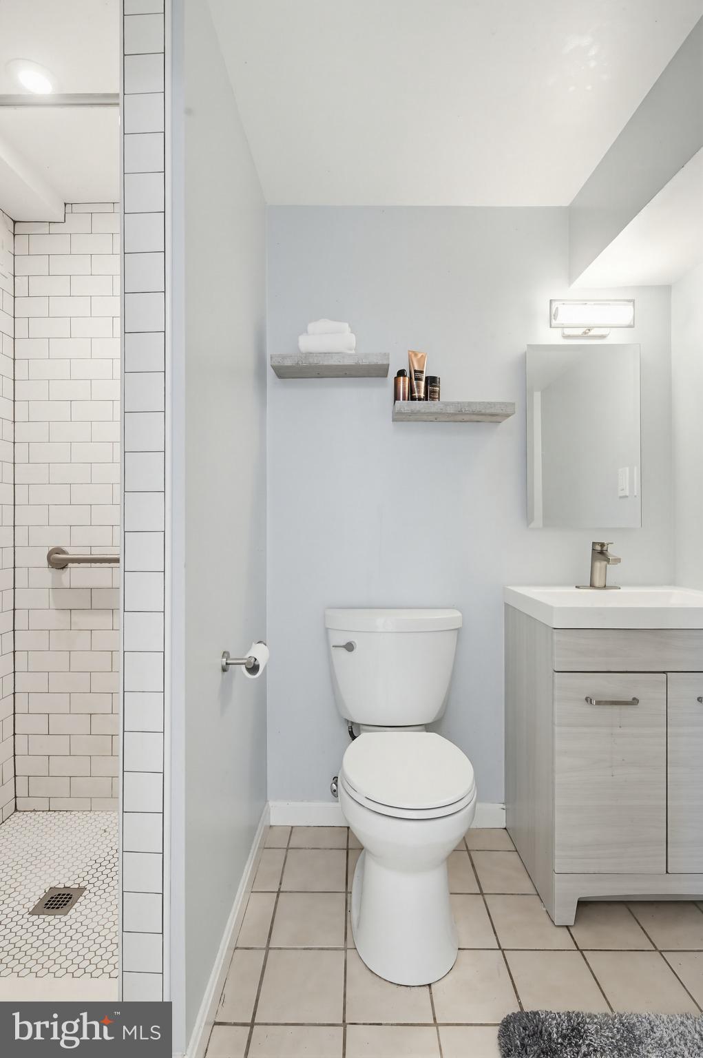 3067 Schubert Drive Silver Spring, MD 20904 - Photo 27 of 41 a bathroom with a toilet and a sink