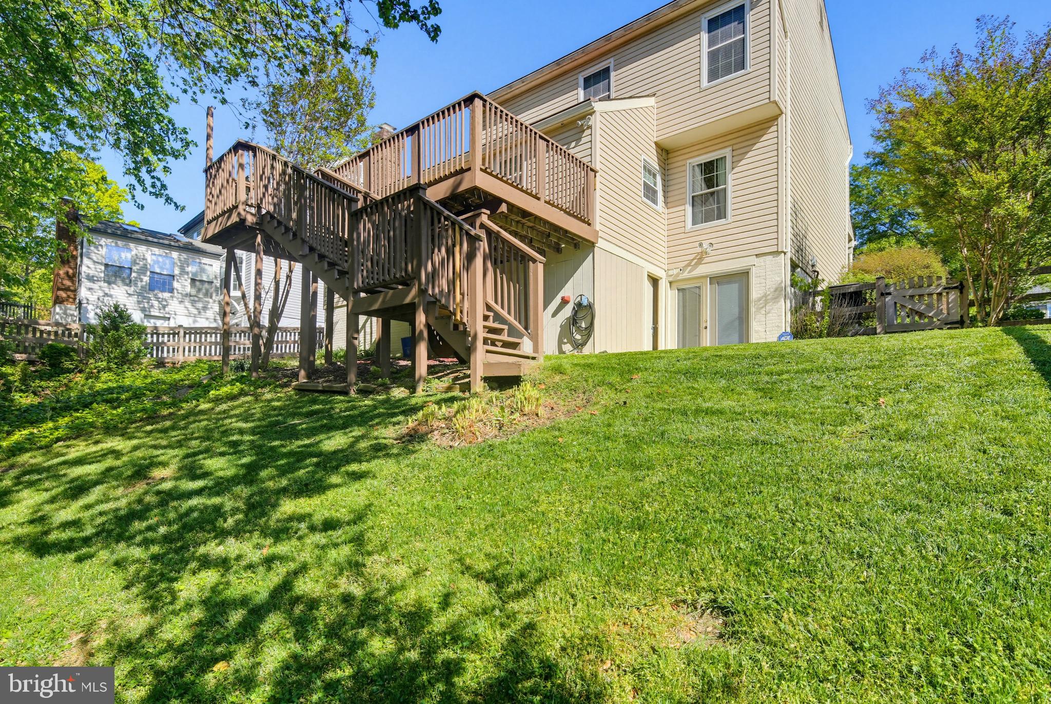 3067 Schubert Drive Silver Spring, MD 20904 - Photo 32 of 41 a view of a big house with a big yard and large trees