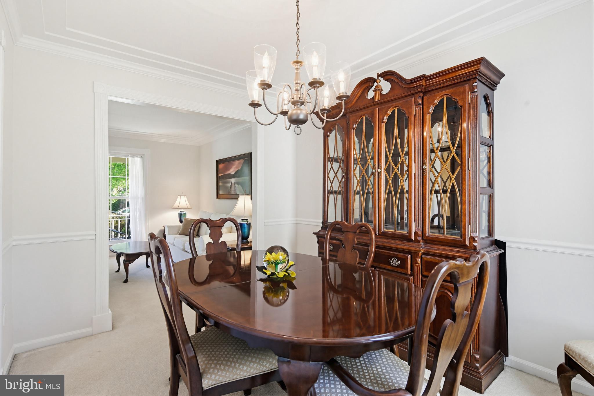 3067 Schubert Drive Silver Spring, MD 20904 - Photo 9 of 41 a view of a dining room with furniture and chandelier