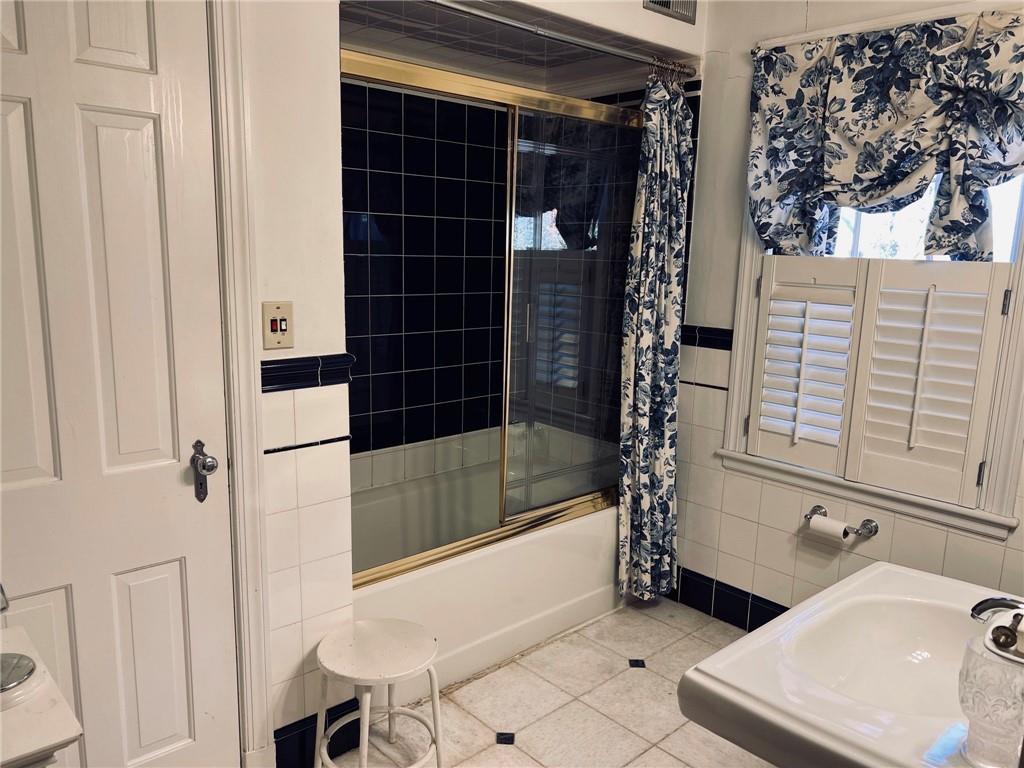114 Edgewood Road Butler, PA 16001 - Photo 13 of 25 a bathroom with a bathtub and shower