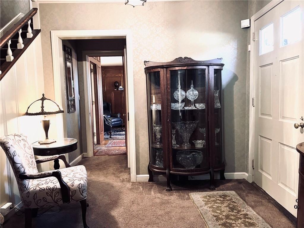 114 Edgewood Road Butler, PA 16001 - Photo 8 of 25 a glass room with table and chairs