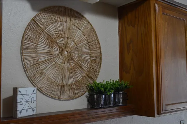 a kitchen with stainless steel appliances a refrigerator sink and cabinets