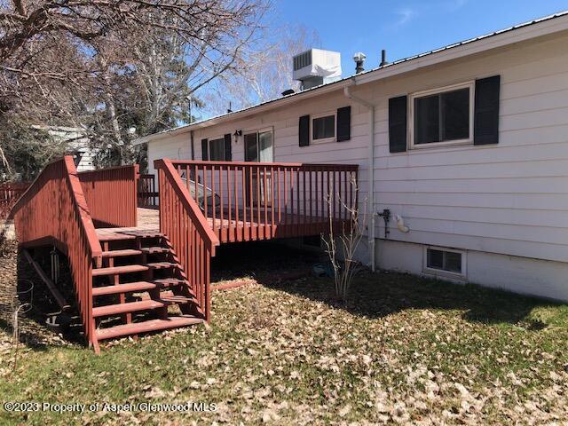 558 Steele Street Craig, CO 81625 - Photo 16 of 52 a front view of a house with wooden stairs
