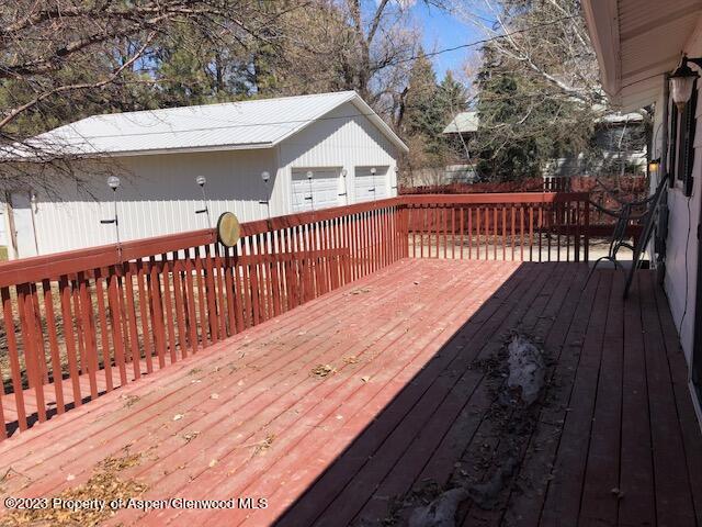 558 Steele Street Craig, CO 81625 - Photo 21 of 52 a view of balcony with wooden floor and fence