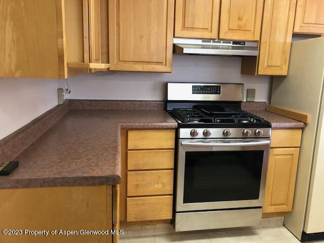 558 Steele Street Craig, CO 81625 - Photo 27 of 52 a stove top oven sitting inside of a kitchen