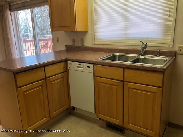 558 Steele Street Craig, CO 81625 - Photo 28 of 52 a kitchen with a sink and a window