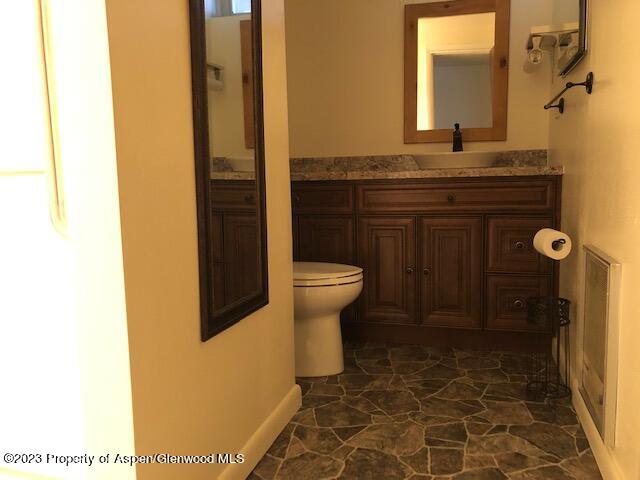 558 Steele Street Craig, CO 81625 - Photo 42 of 52 a bathroom with a sink and a toilet