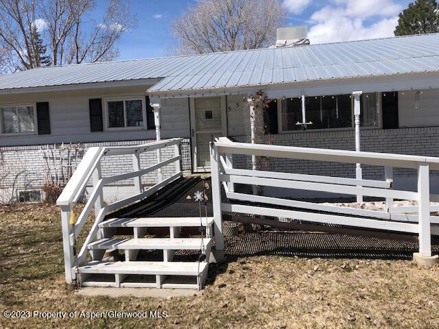 558 Steele Street Craig, CO 81625 - Photo 7 of 52 a view of a house with a large window