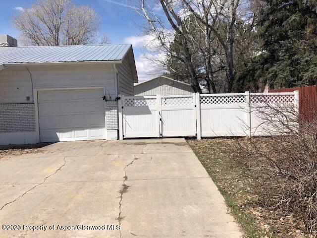 558 Steele Street Craig, CO 81625 - Photo 9 of 52 a view of a backyard of the house