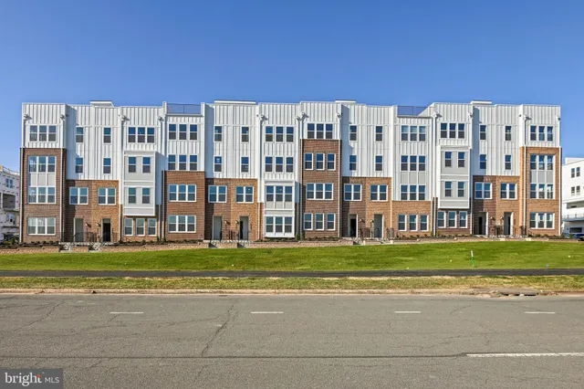 a building with a yard in front of it