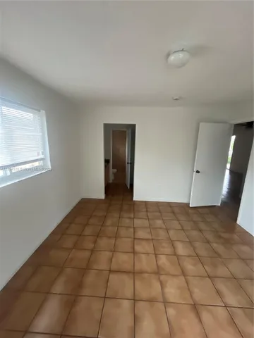 a view of a livingroom with a staircase