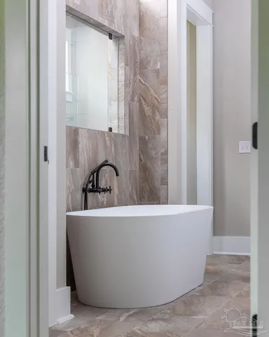 a view of a bathtub in a bathroom