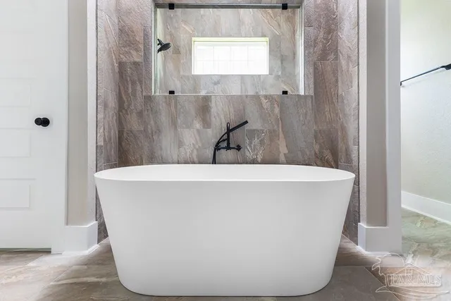 a view of a bathtub in a bathroom