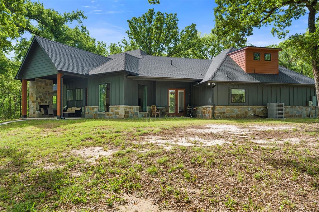 265 Shadow Oaks Streetman, TX 75859 - Photo 32 of 40 a front view of a house with a yard