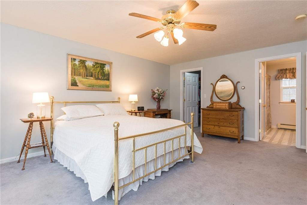6 Westwoods Road Kennebunk, ME 04043 - Photo 21 of 34 The master walk-in closet to the...