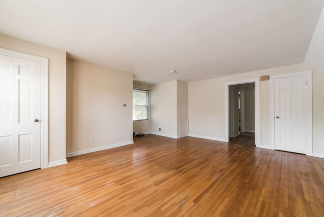645 Normal Road DeKalb, IL 60115 - Photo 13 of 24 a view of an empty room and wooden floor