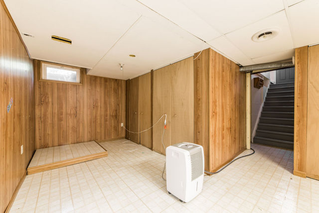 645 Normal Road DeKalb, IL 60115 - Photo 16 of 24 a view of entryway with wooden walls