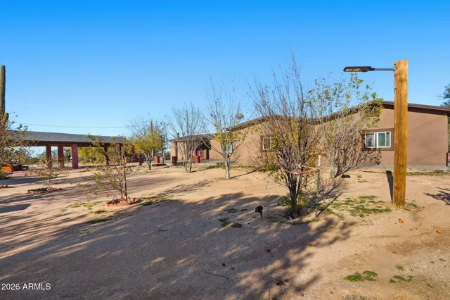 a view of swimming pool with a yard