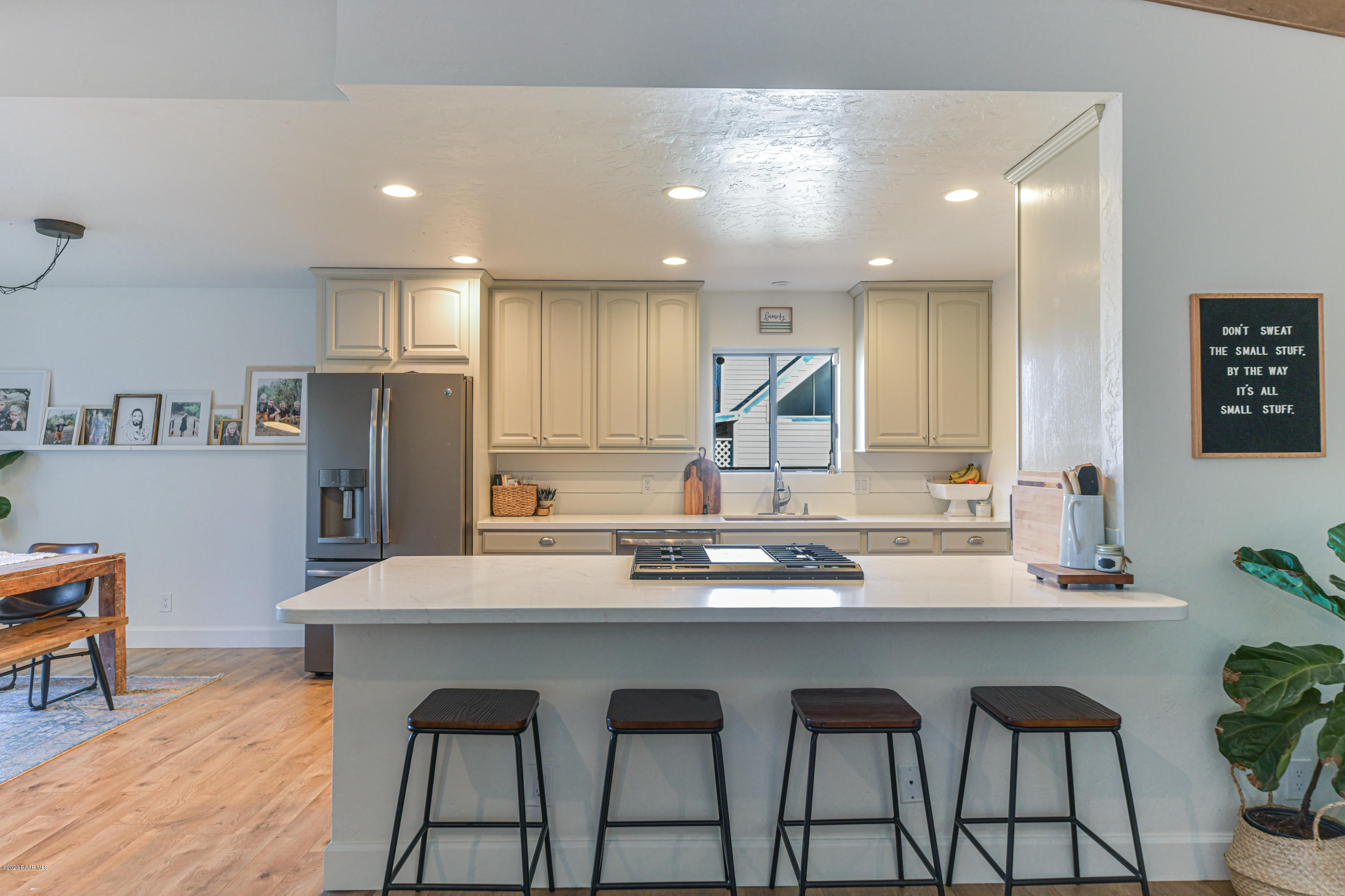 2740 Ridge Road Prescott, AZ 86301 - Photo 9 of 41 a kitchen with stainless steel appliances granite countertop a stove a sink and a refrigerator