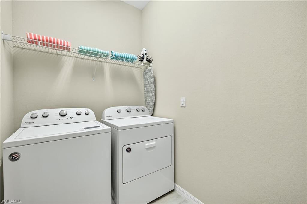 19169 Elston Way Estero, FL 33928 - Photo 28 of 44 a utility room with dryer and washer
