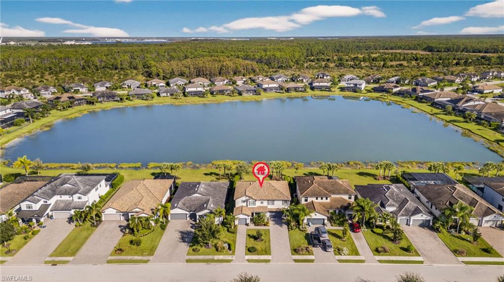 19169 Elston Way Estero, FL 33928 - Photo 36 of 44 an aerial view of residential houses with outdoor space