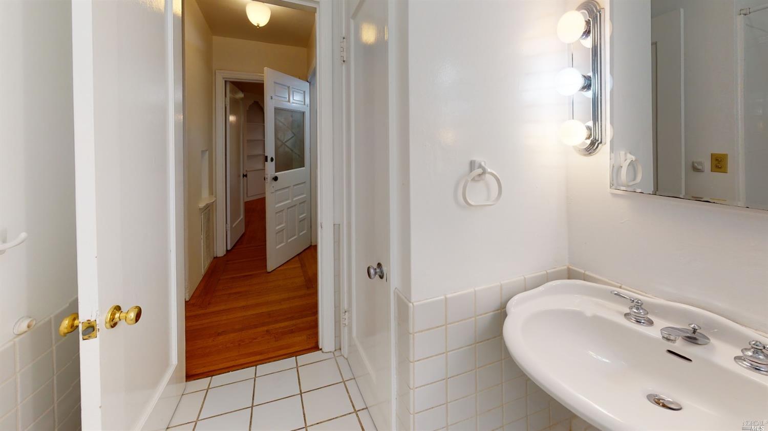 77 Homestead Boulevard Mill Valley, CA 94941 - Photo 39 of 56 a bathroom with a sink and shower