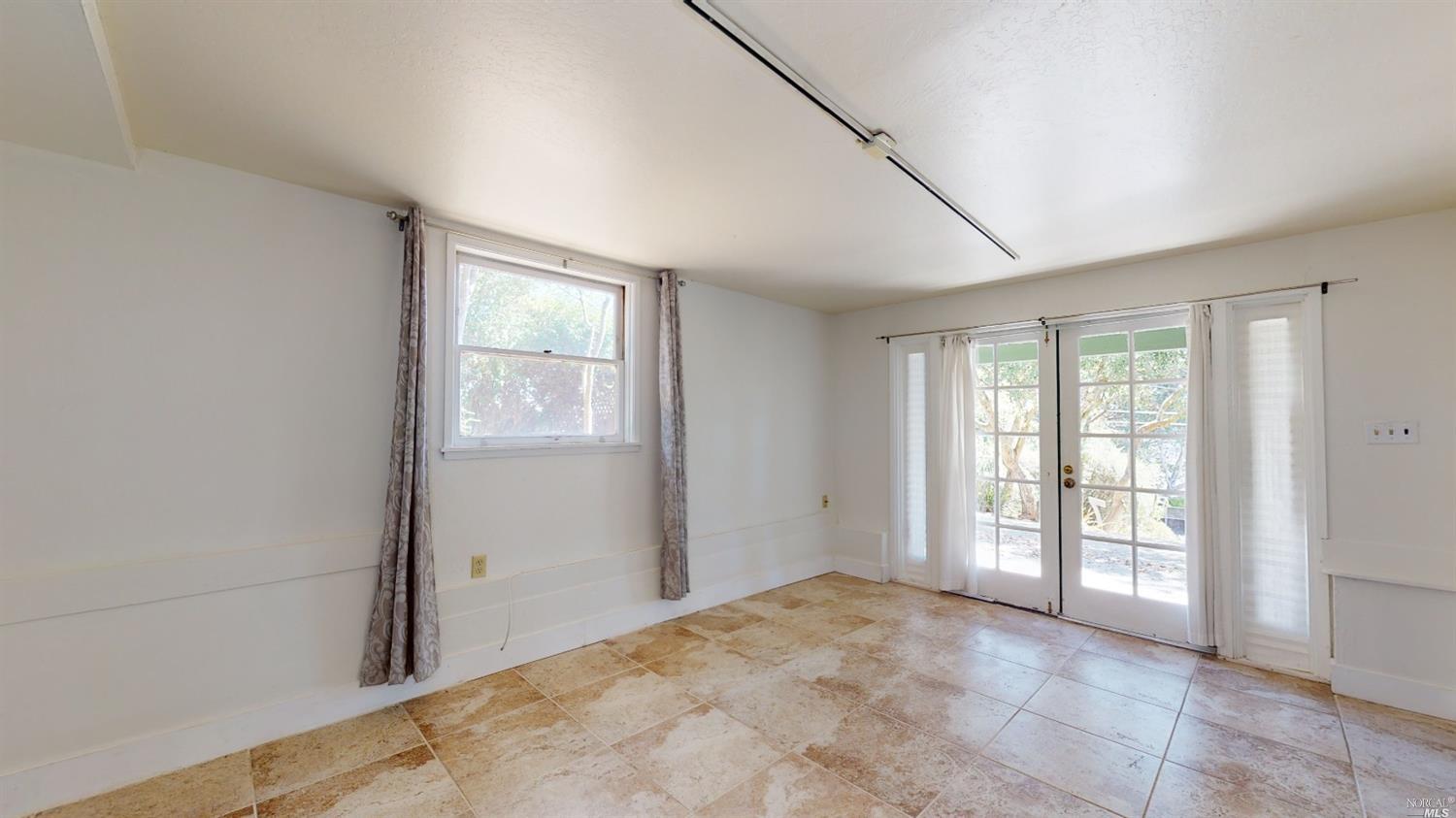 77 Homestead Boulevard Mill Valley, CA 94941 - Photo 5 of 56 a view of an empty room with a window