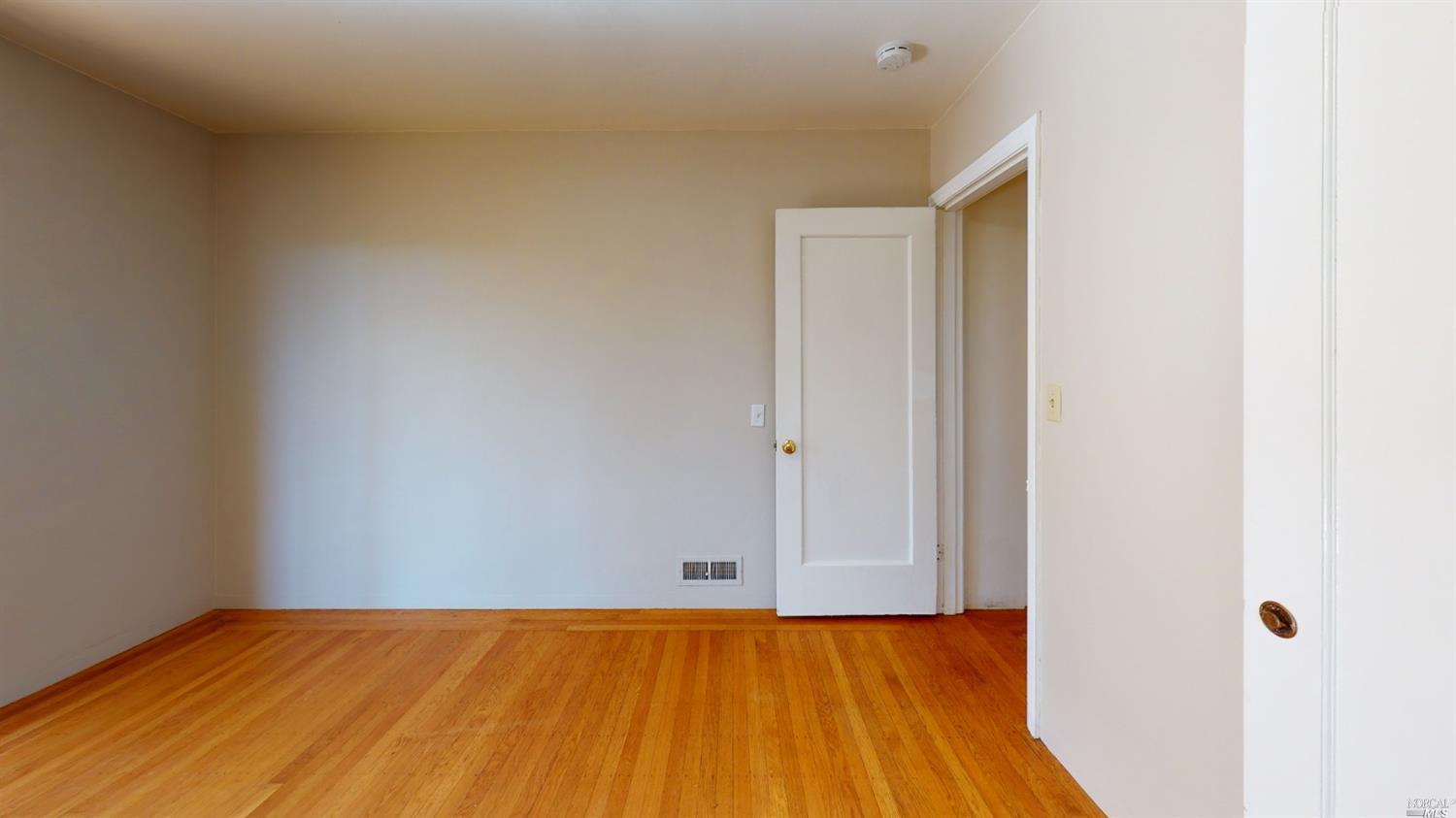 77 Homestead Boulevard Mill Valley, CA 94941 - Photo 47 of 56 a view of an empty room with wooden floor