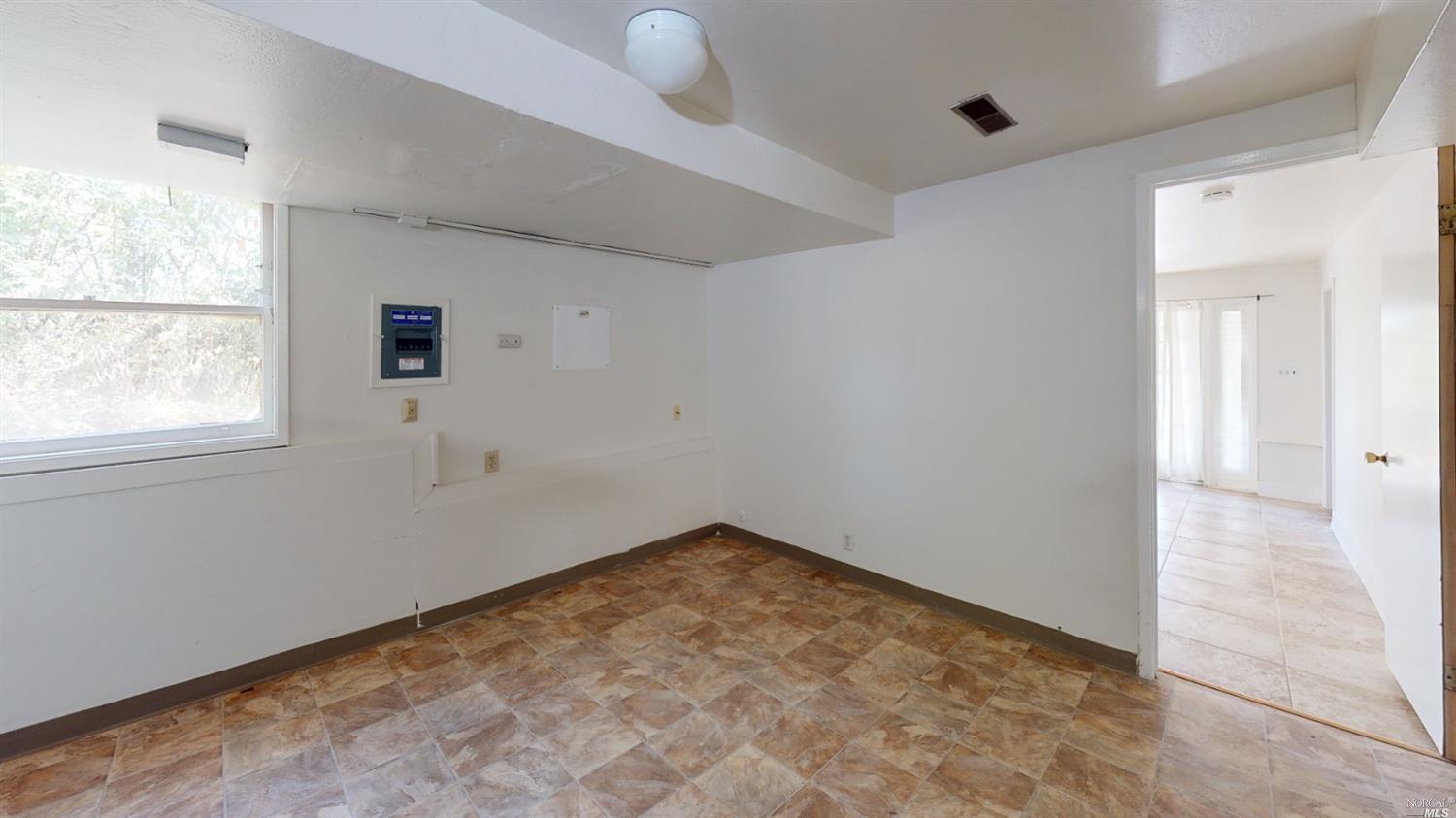 77 Homestead Boulevard Mill Valley, CA 94941 - Photo 49 of 56 an empty room with a empty space and windows