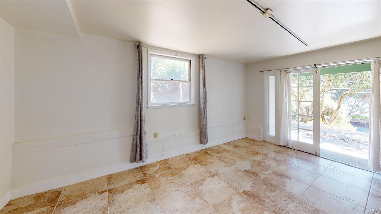 77 Homestead Boulevard Mill Valley, CA 94941 - Photo 54 of 56 an empty room with windows