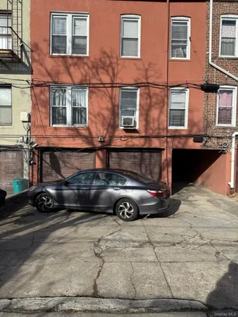 a car parked in front of a building