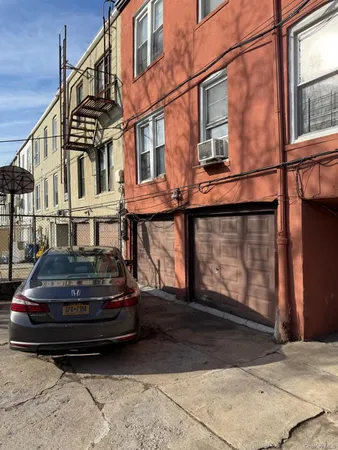 a car parked in front of a house