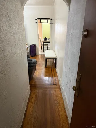 a view of a bathroom with a sink and a mirror