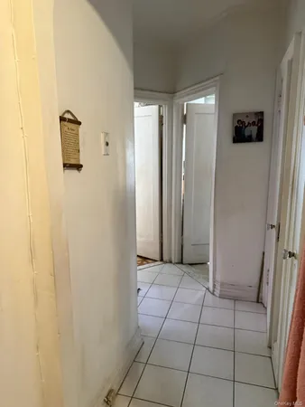 a view of a hallway with closet