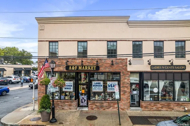 a view of street with shops