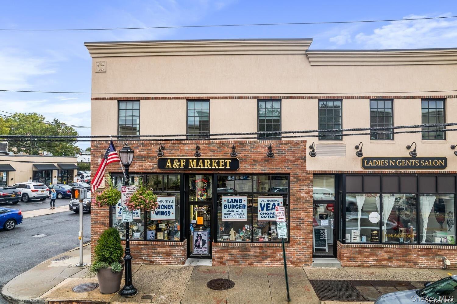 401 A Plandome Road Manhasset, NY 11030 - Photo 1 of 1 a view of street with shops
