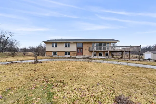 a swimming pool view with a outdoor seating