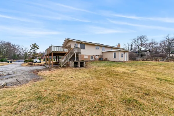 a view of a house with swimming pool