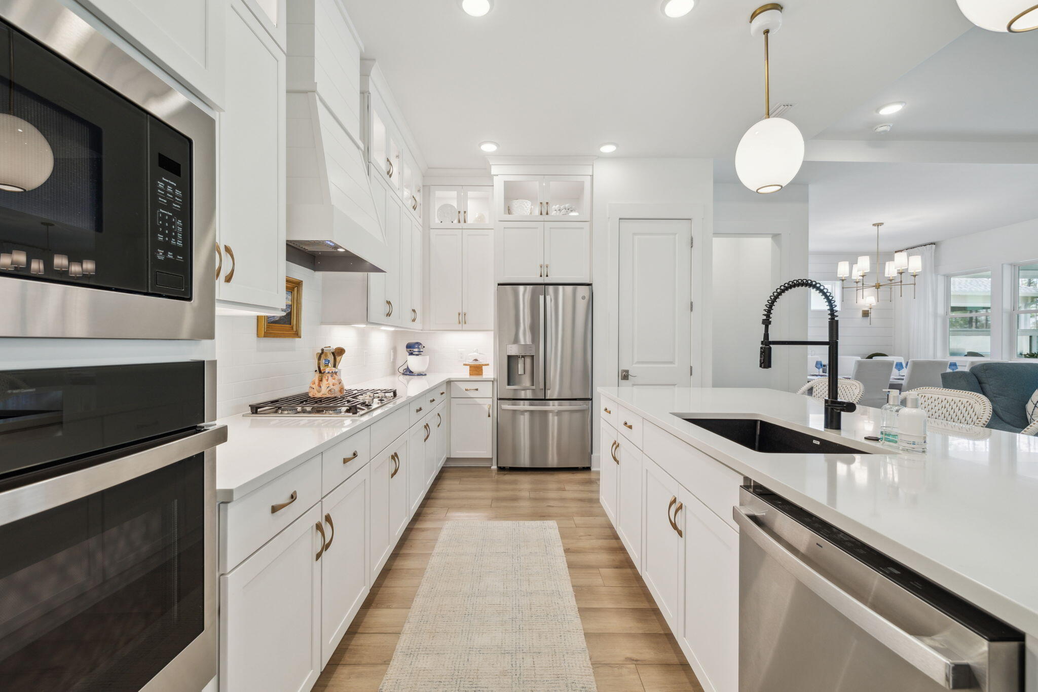 282 West Lafayette Rd Inlet Beach Inlet Beach, FL 32461 - Photo 14 of 40 a large kitchen with stainless steel appliances a stove sink and cabinets