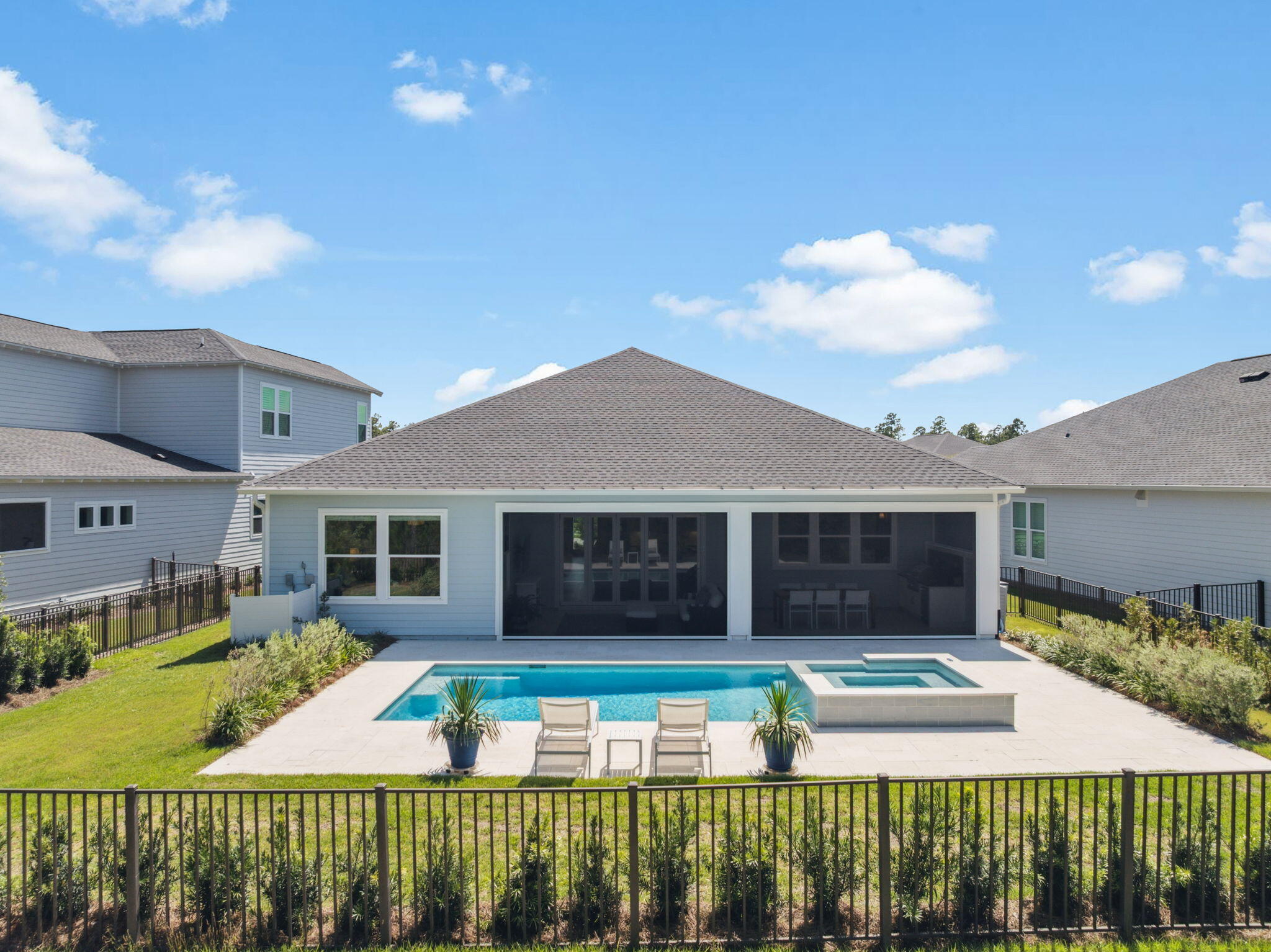 282 West Lafayette Rd Inlet Beach Inlet Beach, FL 32461 - Photo 20 of 40 a front view of a house with a garden and plants